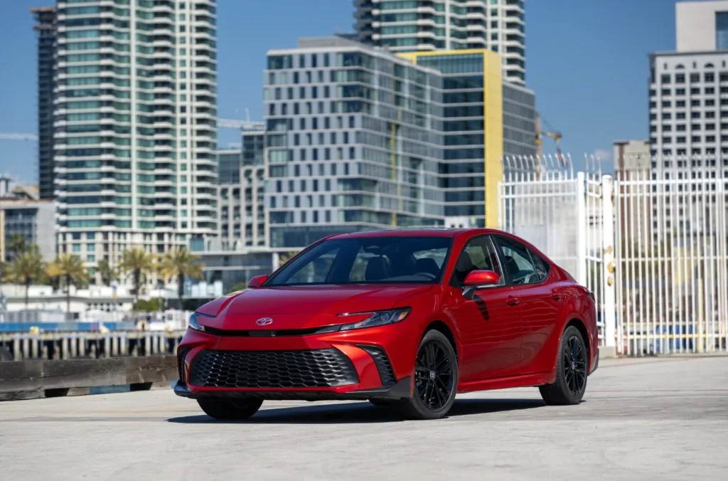 2025 Toyota Camry Hybrid parked near Tampa Bay waterfront causeway