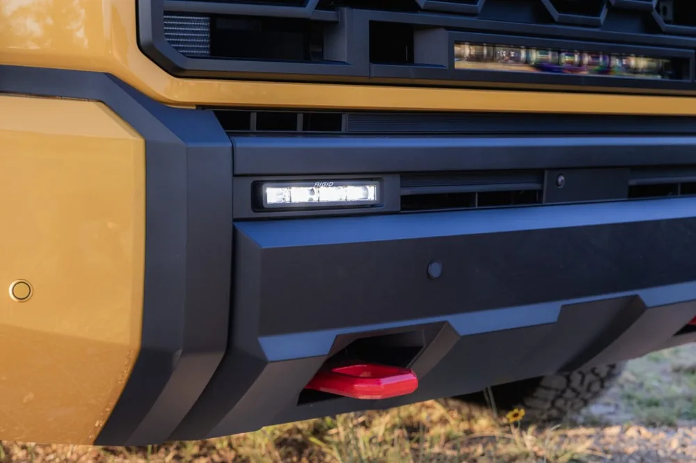 Toyota Tundra TRD heavy-duty integrated red recovery tow hook and RIGID LED lighting